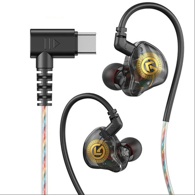 A pair of in-ear monitors with transparent housing, gold and black branding, black ear hooks, and multicolor braided cables, shown with a USB-C to right-angle adapter on a white background.